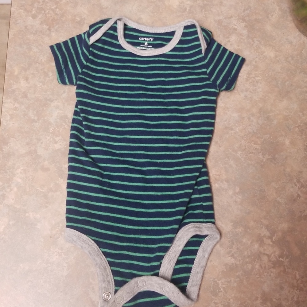 Blue and green striped onesie with gray trim.